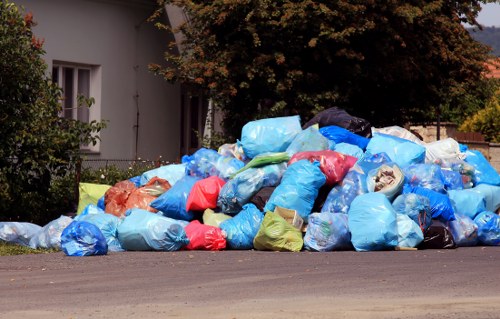 Workers assessing a commercial waste site